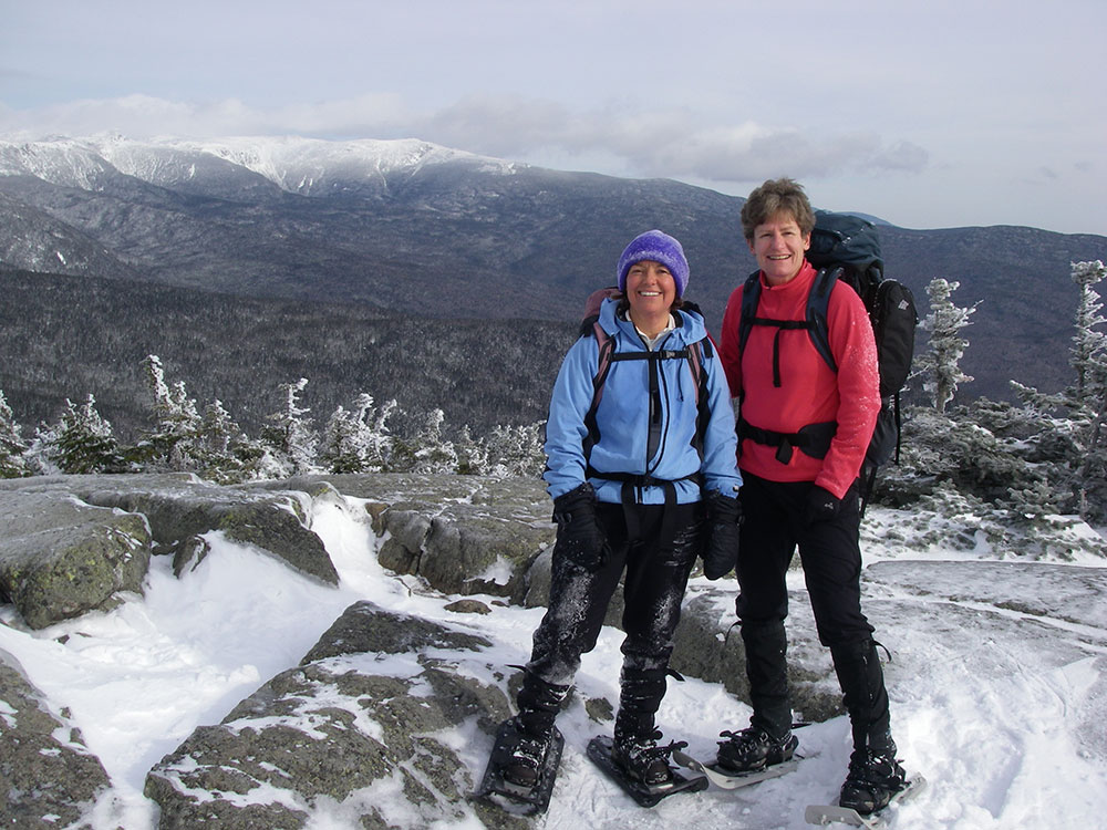 two hikers on the summit of Mt. Jackson