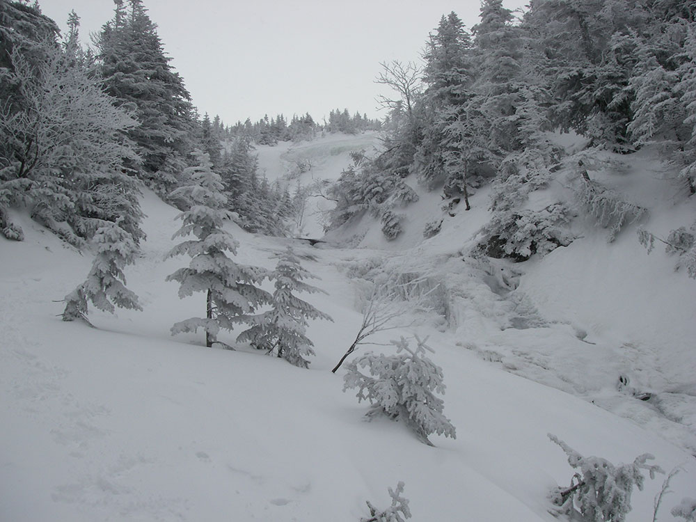 view of cloud covered winter scene climbing Mt. Washington