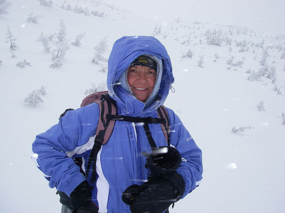 hiker on trail climbing Mt. Washington