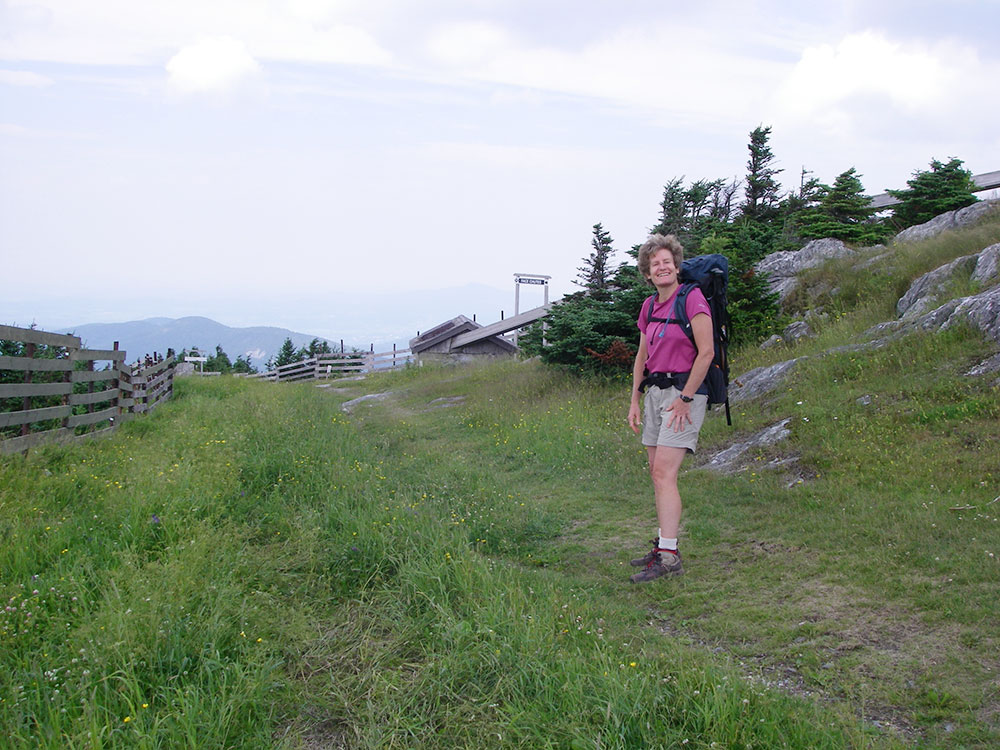 hiker on ski slope