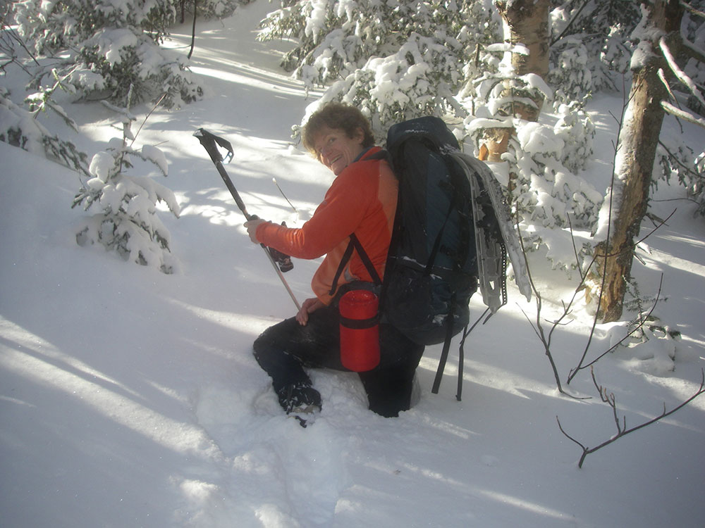 hiker in deep snow