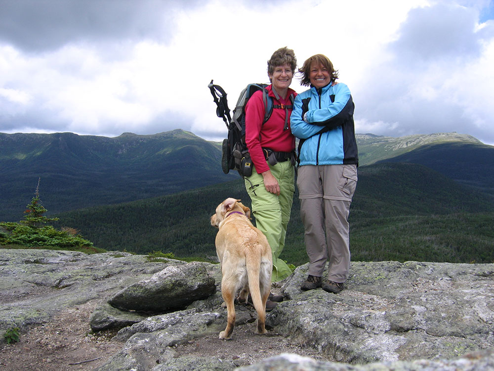 two women hikers on summit of Mt Ioslation