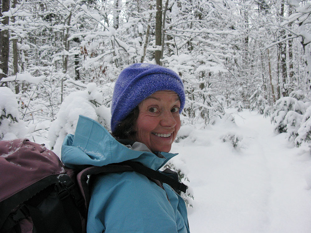 hiker on the trail in winter