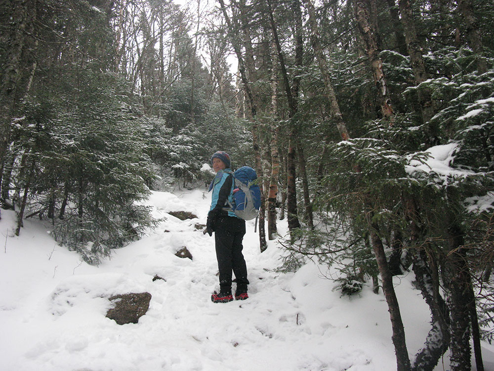 hiker on the trail in winter