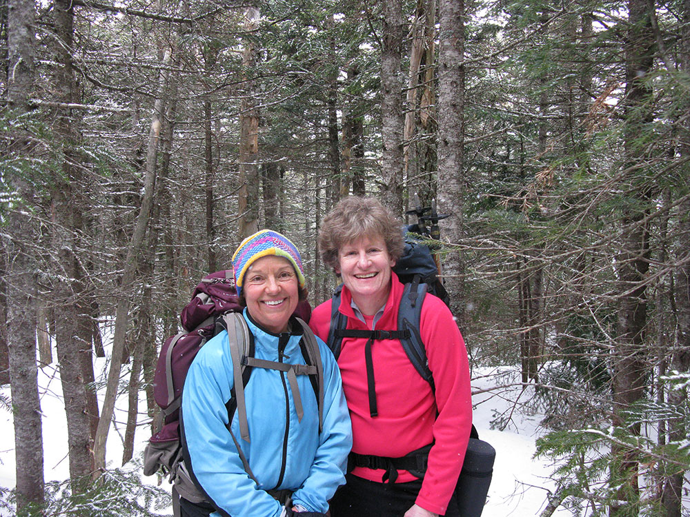 two hikers posing for a selfie