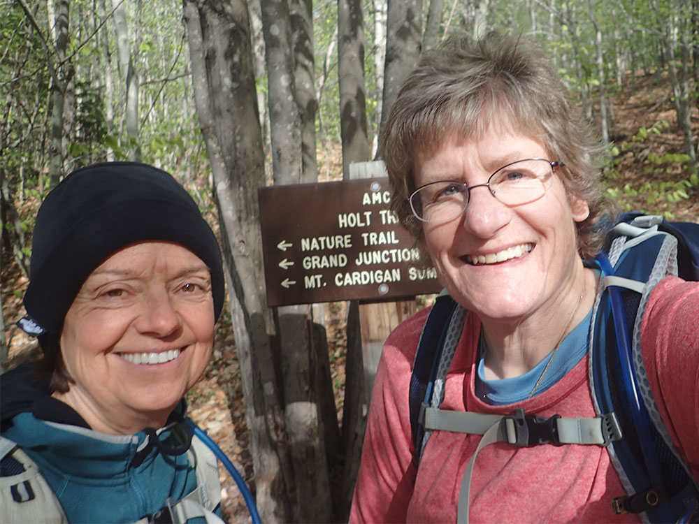 two hikers taking a selfie at the trailhead
