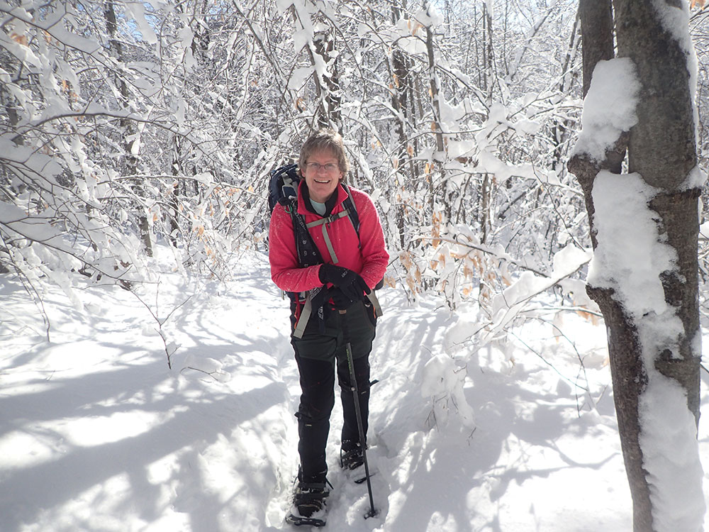 Pat hiker on the trail in showshoes