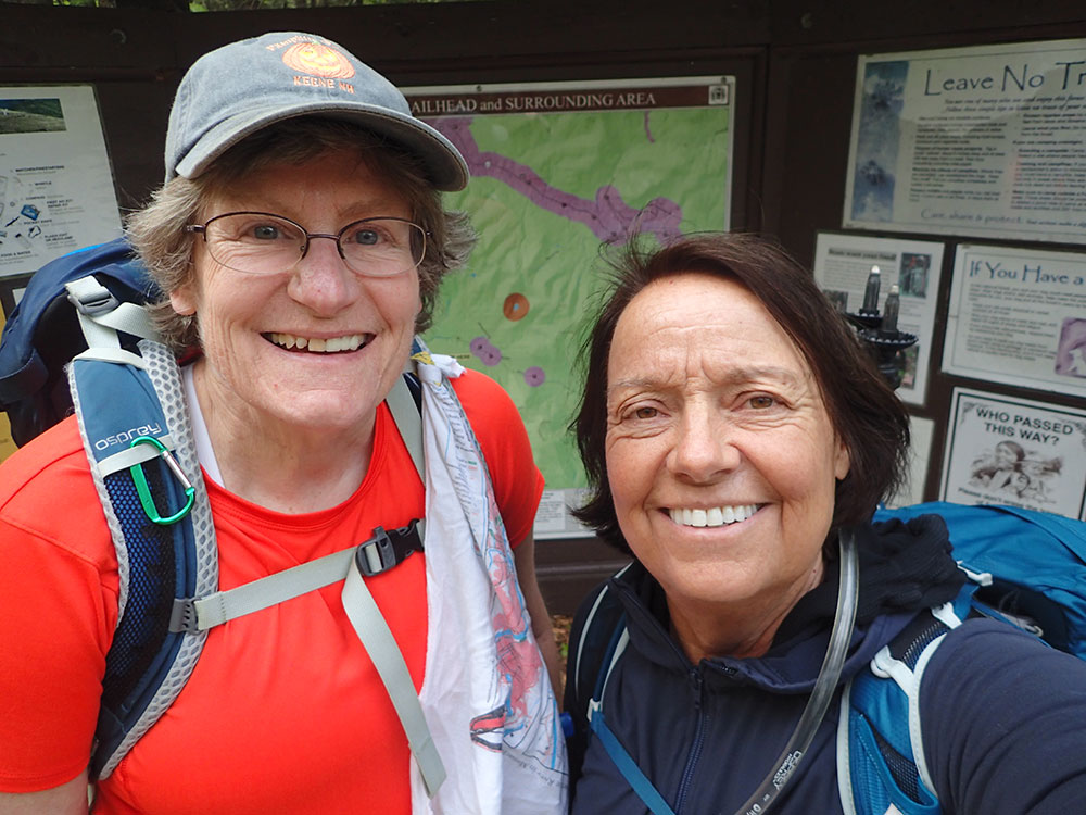hikers taking a selfie at the trailhead