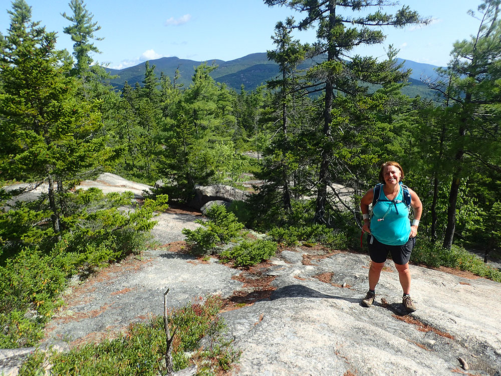 Nancy hiker on the trail above tree line
