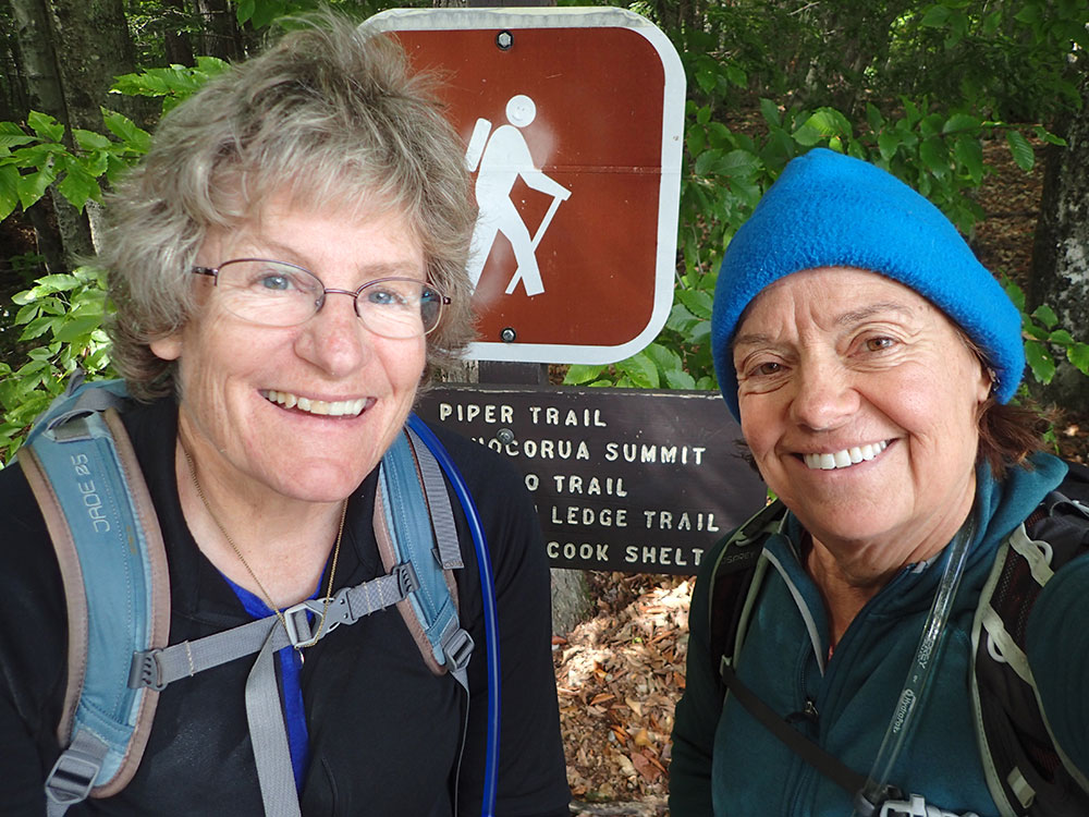 Nancy and Pat two hikers taking at selfie at the end of the trail