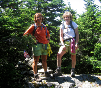 two women hikers on summit